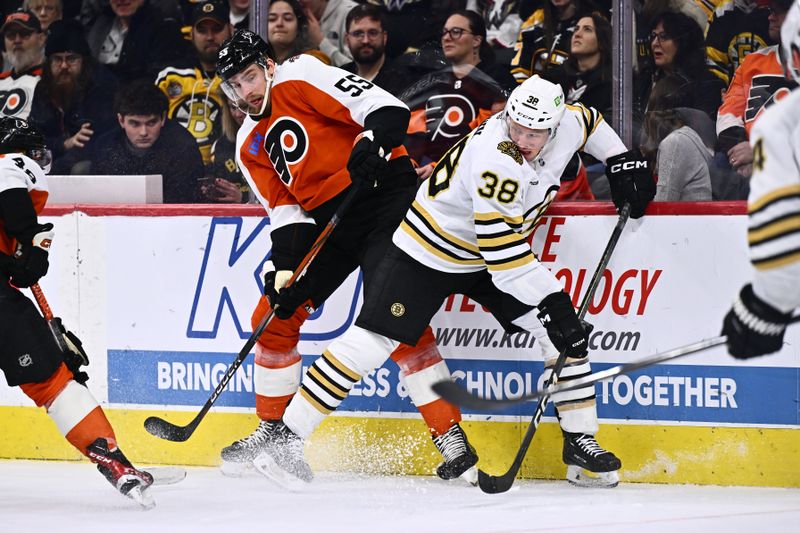 Jan 27, 2024; Philadelphia, Pennsylvania, USA; Philadelphia Flyers defenseman Rasmus Ristolainen (55) and Boston Bruins center Patrick Brown (38) battle for position in the first period at Wells Fargo Center. Mandatory Credit: Kyle Ross-USA TODAY Sports