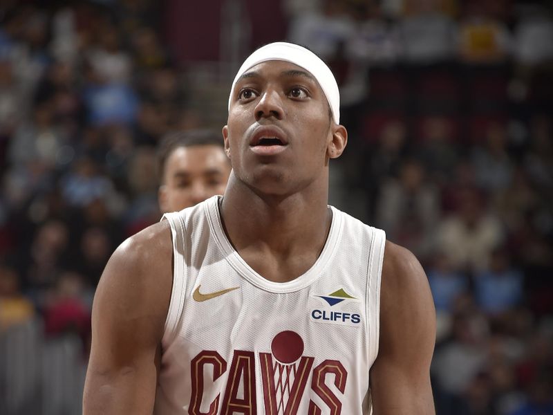 CLEVELAND, OH - APRIL 13: Nae'Qwan Tomlin #30 of the Cleveland Cavaliers shoots a free throw during the game against the Indiana Pacers on April 13, 2025 at Rocket Arena in Cleveland, Ohio. NOTE TO USER: User expressly acknowledges and agrees that, by downloading and/or using this Photograph, user is consenting to the terms and conditions of the Getty Images License Agreement. Mandatory Copyright Notice: Copyright 2025 NBAE (Photo by David Liam Kyle/NBAE via Getty Images)