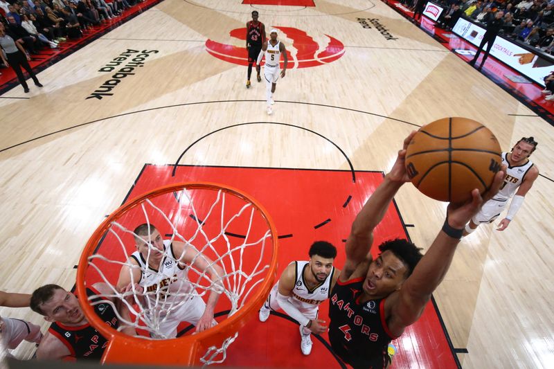 TORONTO, CANADA - MARCH 14: Scottie Barnes #4 of the Toronto Raptors drives to the basket during the game against the Denver Nuggets on March 14, 2023 at the Scotiabank Arena in Toronto, Ontario, Canada.  NOTE TO USER: User expressly acknowledges and agrees that, by downloading and or using this Photograph, user is consenting to the terms and conditions of the Getty Images License Agreement.  Mandatory Copyright Notice: Copyright 2023 NBAE (Photo by Vaughn Ridley/NBAE via Getty Images)