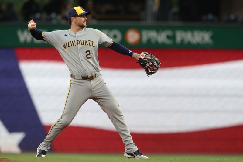 May 23, 2025; Pittsburgh, Pennsylvania, USA;   Milwaukee Brewers second baseman Brice Turang (2) warms up before the bottom of the third inning against the Pittsburgh Pirates at PNC Park. Mandatory Credit: Charles LeClaire-Imagn Images