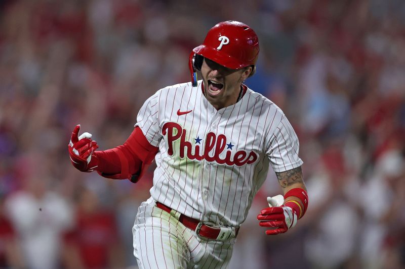 Oct 3, 2023; Philadelphia, Pennsylvania, USA; Philadelphia Phillies second baseman Bryson Stott (5) reacts after hitting a RBI single in the fourth inning against the Miami Marlins for game one of the Wildcard series for the 2023 MLB playoffs at Citizens Bank Park. Mandatory Credit: Bill Streicher-USA TODAY Sports