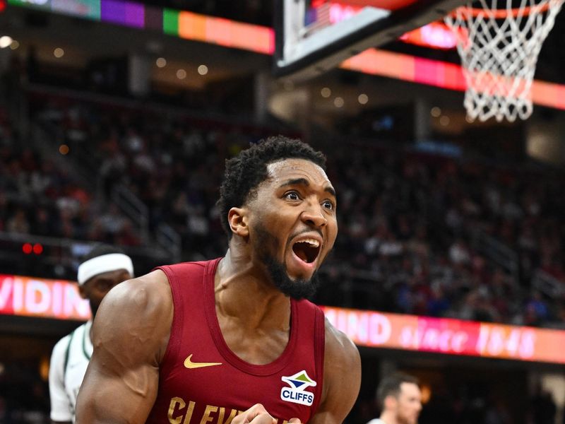 CLEVELAND, OHIO - NOVEMBER 04: Donovan Mitchell #45 of the Cleveland Cavaliers reacts during the fourth quarter against the Milwaukee Bucks at Rocket Mortgage Fieldhouse on November 04, 2024 in Cleveland, Ohio. The Cavaliers defeated the Bucks 116-114. NOTE TO USER: User expressly acknowledges and agrees that, by downloading and or using this photograph, User is consenting to the terms and conditions of the Getty Images License Agreement. (Photo by Jason Miller/Getty Images)