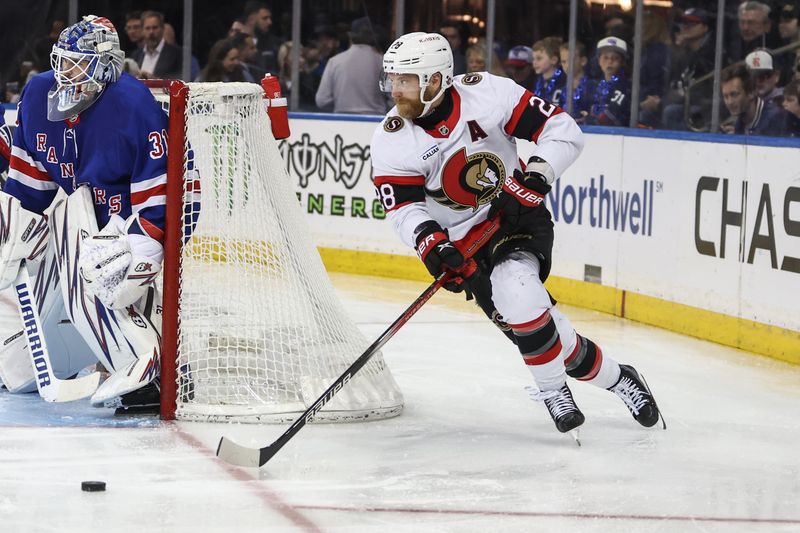 Nov 1, 2024; New York, New York, USA;  Ottawa Senators right wing Claude Giroux (28) controls the puck in the third period against the New York Rangers at Madison Square Garden. Mandatory Credit: Wendell Cruz-Imagn Images