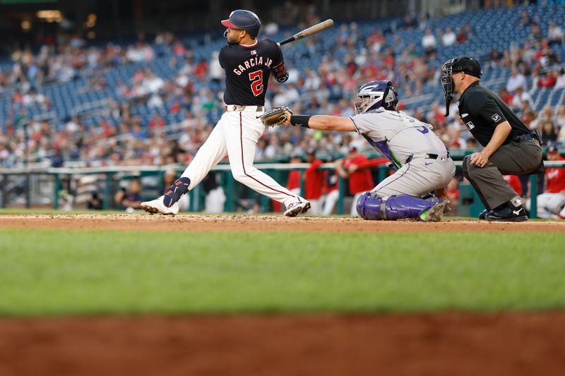Aug 21, 2024; Washington, District of Columbia, USA; Washington Nationals second baseman Luis García Jr. (2) hits a three run home run against the Colorado Rockies during the third inning at Nationals Park. Mandatory Credit: Geoff Burke-USA TODAY Sports