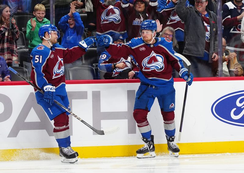 Oct 18, 2024; Denver, Colorado, USA; Colorado Avalanche center Casey Mittelstadt (37) celebrates his goal with right wing Nikolai Kovalenko (51) in the second period against the Anaheim Ducks at Ball Arena. Mandatory Credit: Ron Chenoy-Imagn Images