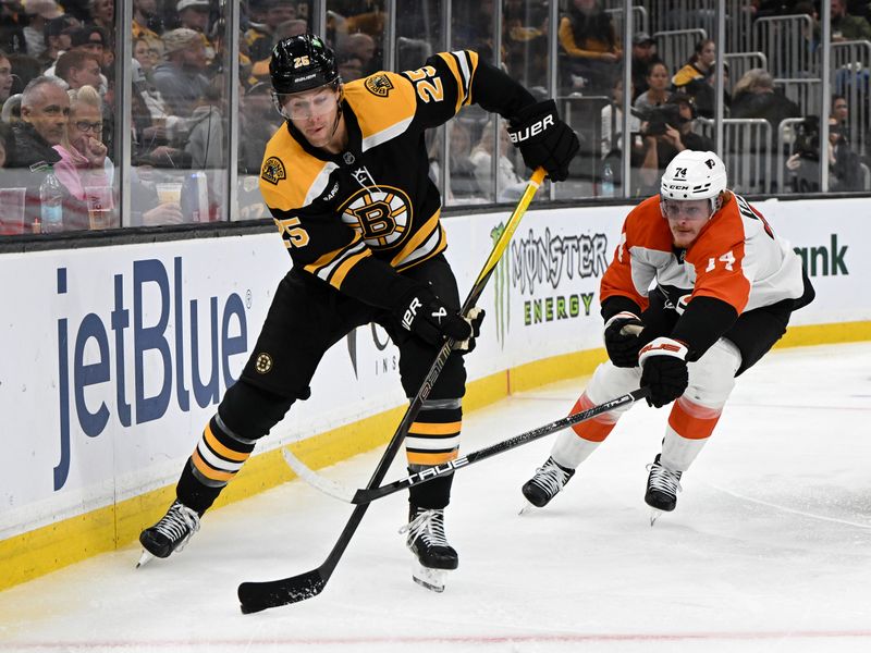 Oct 1, 2024; Boston, Massachusetts, USA; Boston Bruins defenseman Brandon Carlo (25) controls the puck against Philadelphia Flyers right wing Owen Tippett (74) during the second period at the TD Garden. Mandatory Credit: Brian Fluharty-Imagn Images