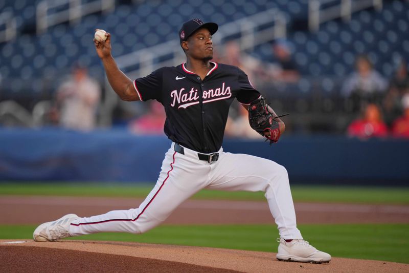 Mar 8, 2024; West Palm Beach, Florida, USA; Washington Nationals starting pitcher Josiah Gray (40) warms-up before the start of the game against the St. Louis Cardinals at CACTI Park of the Palm Beaches. Mandatory Credit: Jim Rassol-USA TODAY Sports