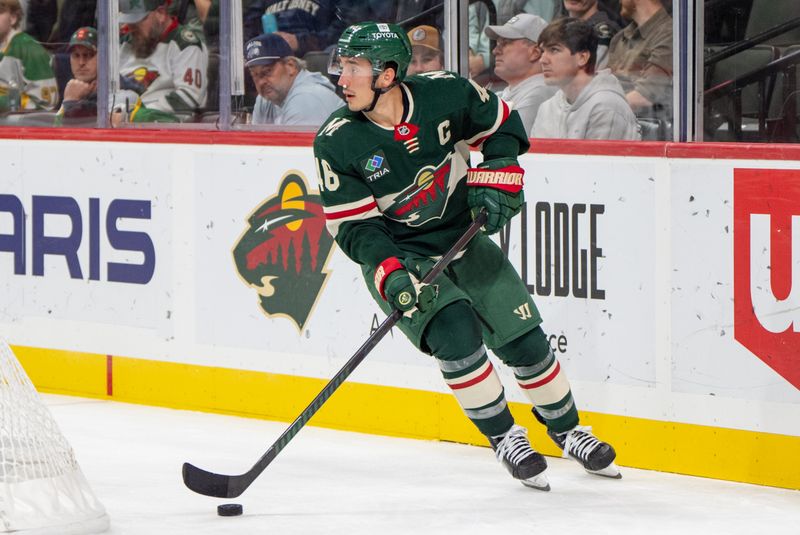 Nov 14, 2024; Saint Paul, Minnesota, USA; Minnesota Wild defenseman Jared Spurgeon (46) returns to the ice with gauze in his nose after drawing a double minor for a high stick on Montreal Canadiens defenseman Jayden Struble (47) in the third period at Xcel Energy Center. Mandatory Credit: Matt Blewett-Imagn Images