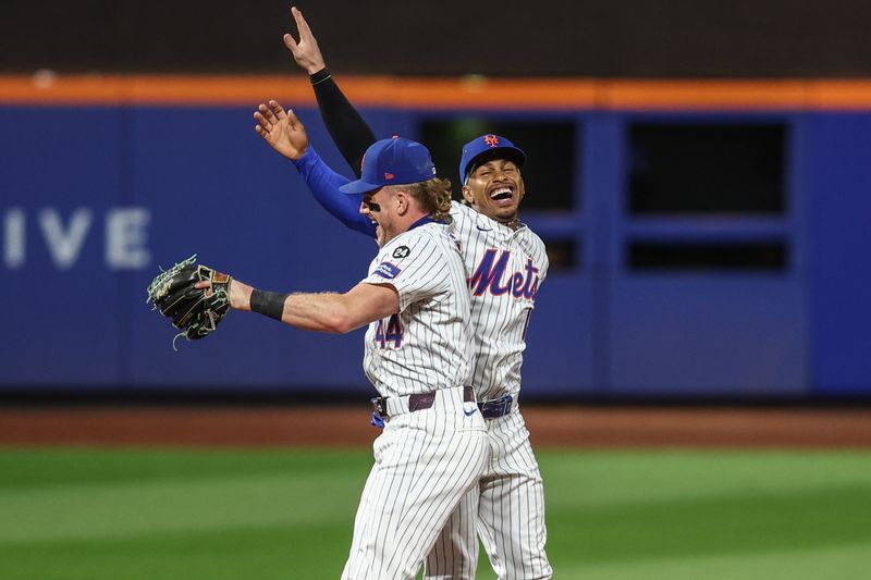 Sep 3, 2024; New York City, New York, USA;  New York Mets center fielder Harrison Bader (44) and shortstop Francisco Lindor (12) celebrate after defeating the Boston Red Sox at Citi Field. Mandatory Credit: Wendell Cruz-Imagn Images