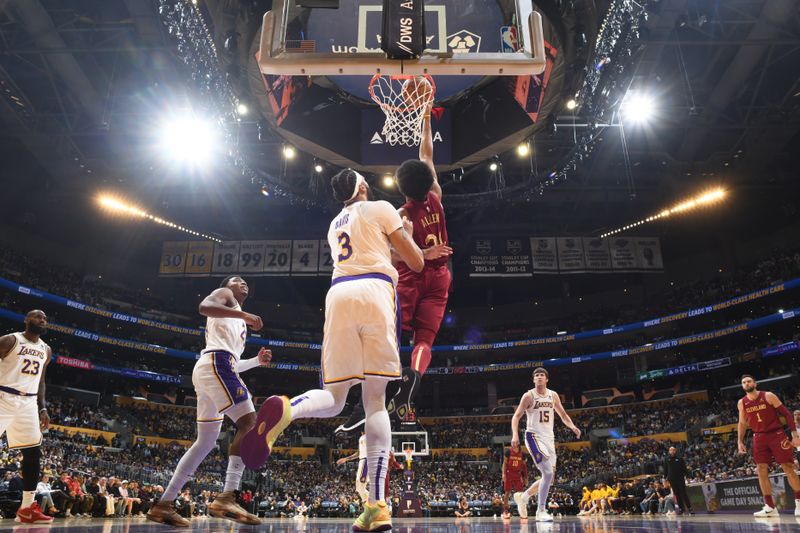 LOS ANGELES, CA - APRIL 6: Jarrett Allen #31 of the Cleveland Cavaliers drives to the basket during the game against the Los Angeles Lakers on April 6, 2024 at Crypto.Com Arena in Los Angeles, California. NOTE TO USER: User expressly acknowledges and agrees that, by downloading and/or using this Photograph, user is consenting to the terms and conditions of the Getty Images License Agreement. Mandatory Copyright Notice: Copyright 2024 NBAE (Photo by Adam Pantozzi/NBAE via Getty Images)