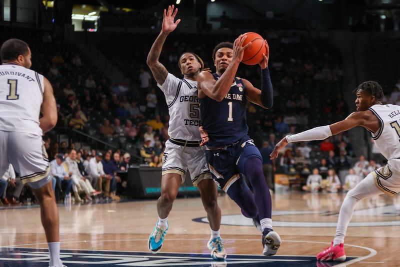 Feb 8, 2023; Atlanta, Georgia, USA; Notre Dame Fighting Irish guard J.J. Starling (1) drives past Georgia Tech Yellow Jackets guard Deivon Smith (5) in the first half at McCamish Pavilion. Mandatory Credit: Brett Davis-USA TODAY Sports