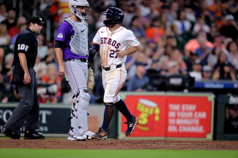 Jun 26, 2024; Houston, Texas, USA; Houston Astros second baseman Jose Altuve (27) crosses home plate to score a run against the Colorado Rockies during the fourth inning at Minute Maid Park. Mandatory Credit: Erik Williams-USA TODAY Sports