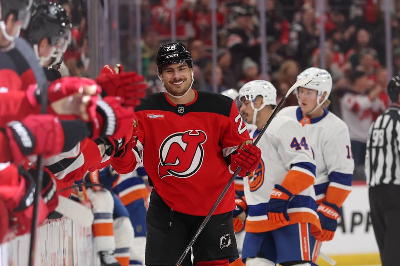 Nov 10, 2025; Newark, New Jersey, USA; New Jersey Devils right wing Timo Meier (28) celebrates his goal against the New York Islanders during the first period at Prudential Center. Mandatory Credit: Ed Mulholland-Imagn Images