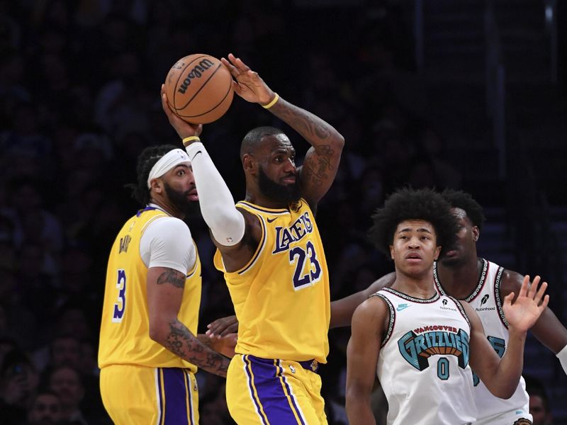 LOS ANGELES, CA - OCTOBER 22:  LeBron James #23 of the Los Angeles Lakers looks to pass the ball during the game against the Memphis Grizzlies on October 22, 2024 at Crypto.com Arena in Los Angeles, California. NOTE TO USER: User expressly acknowledges and agrees that, by downloading and/or using this Photograph, user is consenting to the terms and conditions of the Getty Images License Agreement. Mandatory Copyright Notice: Copyright 2024 NBAE (Photo by Juan Ocampo/NBAE via Getty Images)