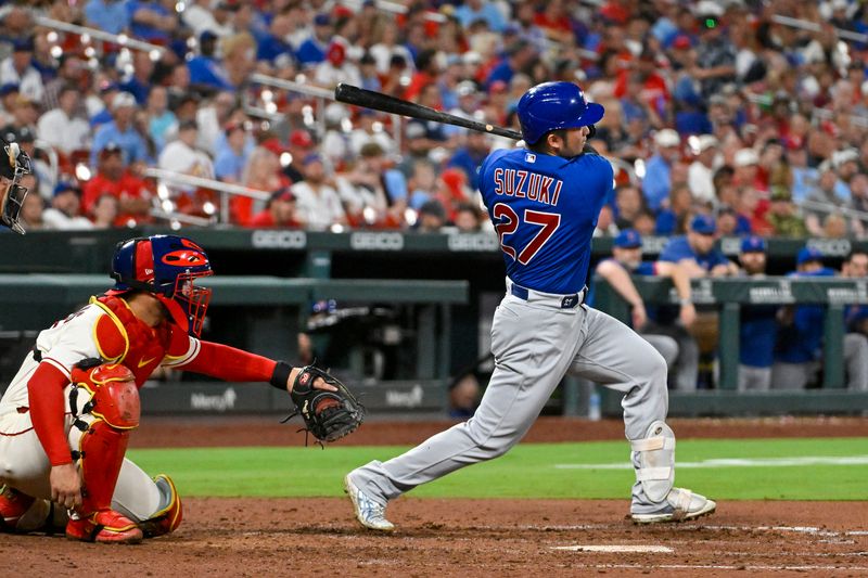 Jul 29, 2023; St. Louis, Missouri, USA;  Chicago Cubs right fielder Seiya Suzuki (27) hits a single against the St. Louis Cardinals during the eighth inning at Busch Stadium. Mandatory Credit: Jeff Curry-USA TODAY Sports