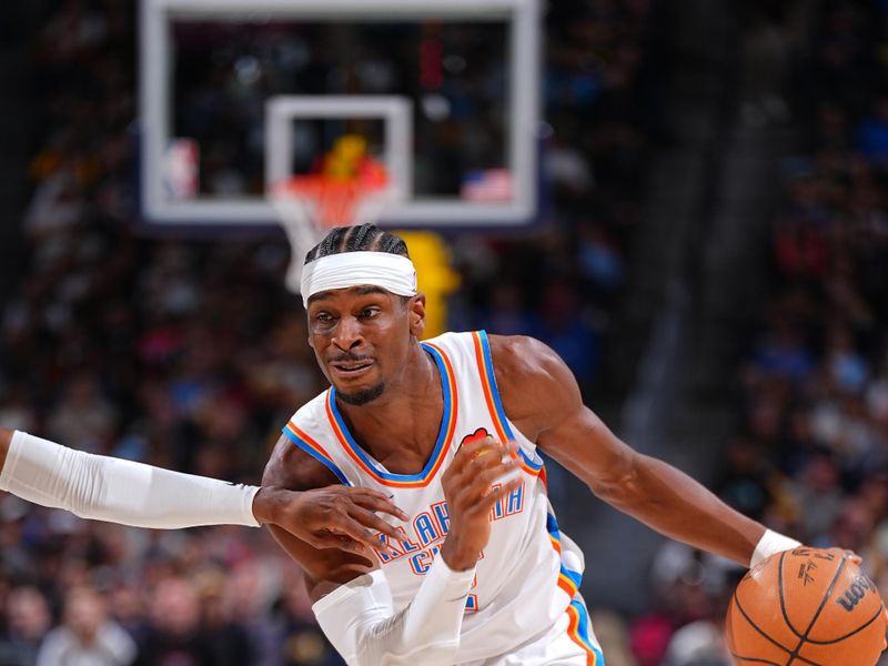 DENVER, CO - NOVEMBER 6: Shai Gilgeous-Alexander #2 of the Oklahoma City Thunder dribbles the ball during the game against the Denver Nuggets on November 6, 2024 at Ball Arena in Denver, Colorado. NOTE TO USER: User expressly acknowledges and agrees that, by downloading and/or using this Photograph, user is consenting to the terms and conditions of the Getty Images License Agreement. Mandatory Copyright Notice: Copyright 2024 NBAE (Photo by Garrett Ellwood/NBAE via Getty Images)