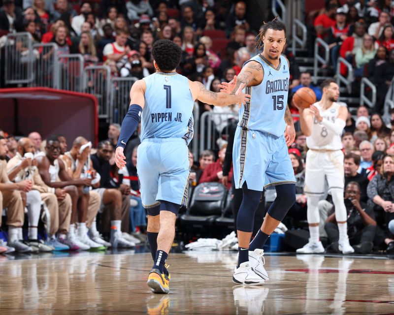 CHICAGO, IL - NOVEMBER 23:  Scotty Pippen Jr. #1 and Brandon Clarke #15 of the Memphis Grizzlies high five during the game against the Chicago Bulls on November 23, 2024 at United Center in Chicago, Illinois. NOTE TO USER: User expressly acknowledges and agrees that, by downloading and or using this photograph, User is consenting to the terms and conditions of the Getty Images License Agreement. Mandatory Copyright Notice: Copyright 2024 NBAE (Photo by Jeff Haynes/NBAE via Getty Images)