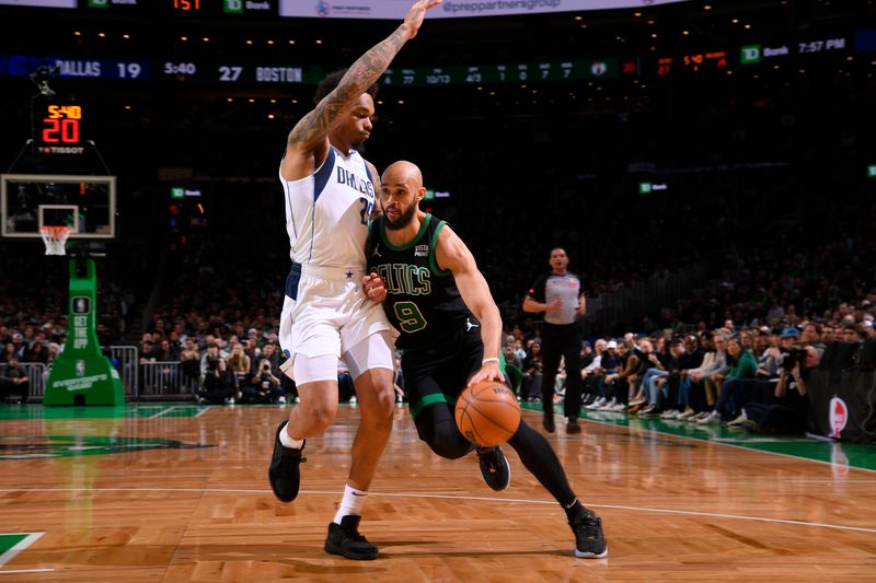 BOSTON, MA - MARCH 1: Derrick White #9 of the Boston Celtics drives to the basket during the game against the Dallas Mavericks on March 1, 2024 at the TD Garden in Boston, Massachusetts. NOTE TO USER: User expressly acknowledges and agrees that, by downloading and or using this photograph, User is consenting to the terms and conditions of the Getty Images License Agreement. Mandatory Copyright Notice: Copyright 2024 NBAE  (Photo by Brian Babineau/NBAE via Getty Images)