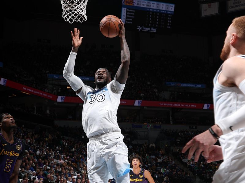 MINNEAPOLIS, MN -  DECEMBER 2: Julius Randle #30 of the Minnesota Timberwolves goes up for the rebound during the game against the Los Angeles Lakers on December 2, 2024 at Target Center in Minneapolis, Minnesota. NOTE TO USER: User expressly acknowledges and agrees that, by downloading and or using this Photograph, user is consenting to the terms and conditions of the Getty Images License Agreement. Mandatory Copyright Notice: Copyright 2024 NBAE (Photo by David Sherman/NBAE via Getty Images)