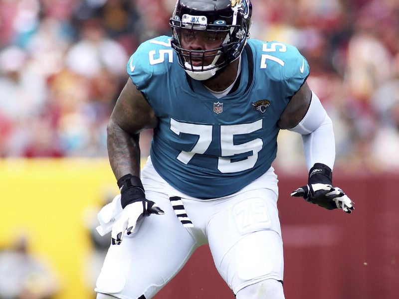 Jacksonville Jaguars offensive tackle Jawaan Taylor (75) blocks during an NFL football game against the Washington Commanders, Sunday, Sept. 11, 2022 in Landover. (AP Photo/Daniel Kucin Jr.)