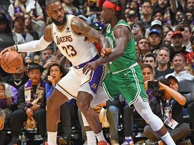 LOS ANGELES, CA - DECEMBER 25: LeBron James #23 of the Los Angeles Lakers dribbles the ball during the game against the Boston Celtics on December 25, 2023 at Crypto.Com Arena in Los Angeles, California. NOTE TO USER: User expressly acknowledges and agrees that, by downloading and/or using this Photograph, user is consenting to the terms and conditions of the Getty Images License Agreement. Mandatory Copyright Notice: Copyright 2023 NBAE (Photo by Andrew D. Bernstein/NBAE via Getty Images)