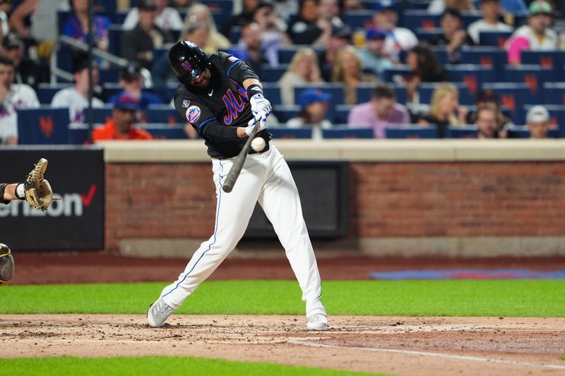 Jun 14, 2024; New York City, New York, USA; New York Mets designated hitter JD Martinez (28) hits an RBI double against the San Diego Padres during the third inning at Citi Field. Mandatory Credit: Gregory Fisher-USA TODAY Sports