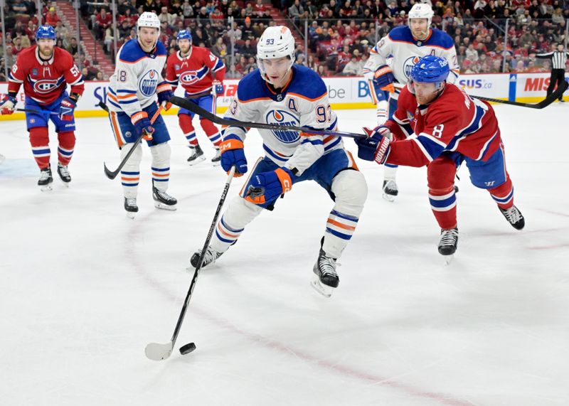 Jan 13, 2024; Montreal, Quebec, CAN; Edmonton Oilers forward Ryan Nugent-Hopkins (93) and Montreal Canadiens defenseman Mike Matheson (8) during the third period at the Bell Centre. Mandatory Credit: Eric Bolte-USA TODAY Sports