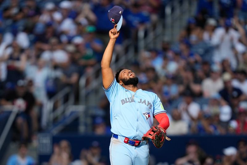 Aug 24, 2024; Toronto, Ontario, CAN; Toronto Blue Jays first baseman Vladimir Guerrero Jr. (27) reacts after a win over the Los Angeles Angels at Rogers Centre. Mandatory Credit: John E. Sokolowski-USA TODAY Sports