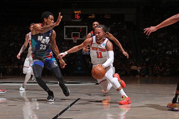 BROOKLYN, NY - DECEMBER 20: Jalen Brunson #11 of the New York Knicks dribbles the ball during the game against the Brooklyn Nets on December 20, 2023 at Barclays Center in Brooklyn, New York. NOTE TO USER: User expressly acknowledges and agrees that, by downloading and or using this Photograph, user is consenting to the terms and conditions of the Getty Images License Agreement. Mandatory Copyright Notice: Copyright 2023 NBAE (Photo by Nathaniel S. Butler/NBAE via Getty Images)