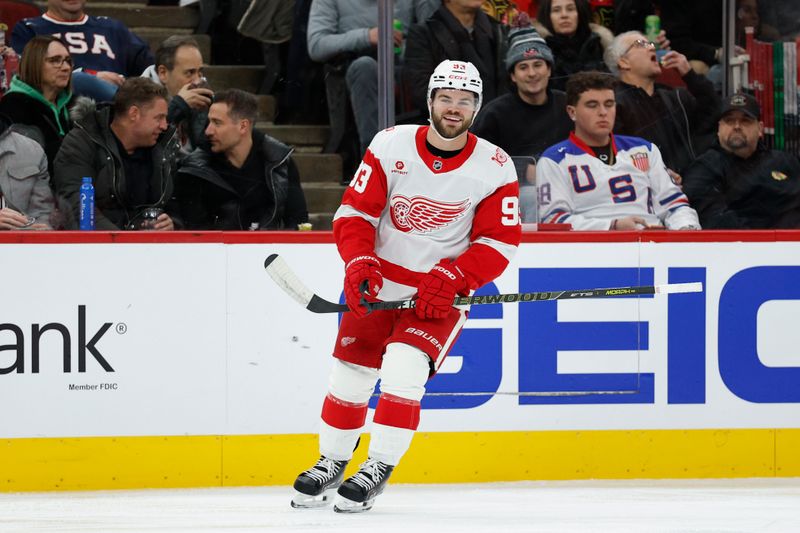 Dec 13, 2025; Chicago, Illinois, USA; Detroit Red Wings right wing Alex Debrincat (93) celebrates after scoring against the Chicago Blackhawks during the first period at United Center. Mandatory Credit: Kamil Krzaczynski-Imagn Images