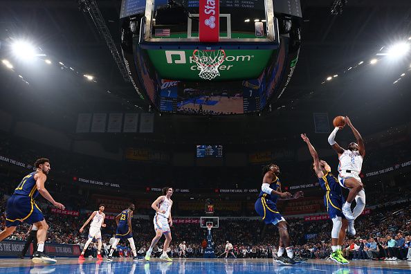 OKLAHOMA CITY, OK - DECEMBER 8: Shai Gilgeous-Alexander #2 of the Oklahoma City Thunder shoots the ball during the game against the Golden State Warriors on December 8, 2023 at Paycom Arena in Oklahoma City, Oklahoma. NOTE TO USER: User expressly acknowledges and agrees that, by downloading and or using this photograph, User is consenting to the terms and conditions of the Getty Images License Agreement. Mandatory Copyright Notice: Copyright 2023 NBAE (Photo by Zach Beeker/NBAE via Getty Images)