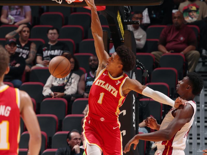 MIAMI, FL - OCTOBER 16: Jalen Johnson #1 of the Atlanta Hawks dunks the ball during the game against the Miami Heat on October 16, 2024 at Miami-Dade Arena in Miami, Florida. NOTE TO USER: User expressly acknowledges and agrees that, by downloading and or using this Photograph, user is consenting to the terms and conditions of the Getty Images License Agreement. Mandatory Copyright Notice: Copyright 2024 NBAE (Photo by Issac Baldizon/NBAE via Getty Images)