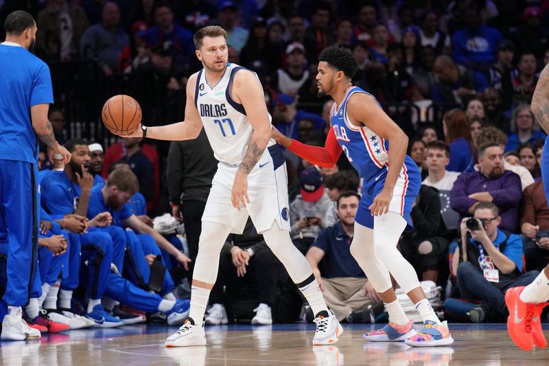 PHILADELPHIA, PA - MARCH 29: Luka Doncic #77 of the Dallas Mavericks dribbles the ball during the game against the Philadelphia 76ers on March 29, 2023 at the Wells Fargo Center in Philadelphia, Pennsylvania NOTE TO USER: User expressly acknowledges and agrees that, by downloading and/or using this Photograph, user is consenting to the terms and conditions of the Getty Images License Agreement. Mandatory Copyright Notice: Copyright 2023 NBAE (Photo by Jesse D. Garrabrant/NBAE via Getty Images)