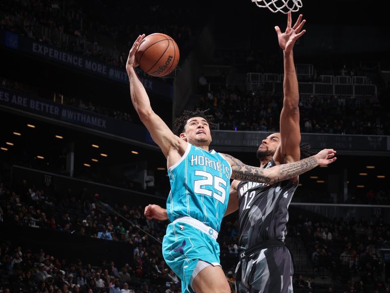 BROOKLYN, NY - FEBRUARY 10: KJ Simpson #25 of the Charlotte Hornets drives to the basket during the game against the Brooklyn Nets on February 10, 2025 at Barclays Center in Brooklyn, New York. NOTE TO USER: User expressly acknowledges and agrees that, by downloading and or using this Photograph, user is consenting to the terms and conditions of the Getty Images License Agreement. Mandatory Copyright Notice: Copyright 2025 NBAE (Photo by Nathaniel S. Butler/NBAE via Getty Images)