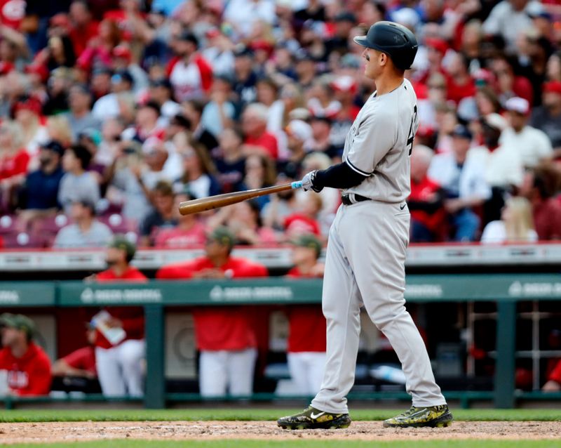 May 20, 2023; Cincinnati, Ohio, USA; New York Yankees first baseman Anthony Rizzo (48) watches the ball after hitting a two-run home run against the Cincinnati Reds during the tenth inning at Great American Ball Park. Mandatory Credit: David Kohl-USA TODAY Sports