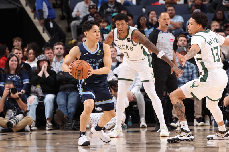 MEMPHIS, TN - OCTOBER 31: Yuki Kawamura #17 of the Memphis Grizzlies passes the ball during the game against the Milwaukee Bucks on October 31, 2024 at FedExForum in Memphis, Tennessee. NOTE TO USER: User expressly acknowledges and agrees that, by downloading and or using this photograph, User is consenting to the terms and conditions of the Getty Images License Agreement. Mandatory Copyright Notice: Copyright 2024 NBAE (Photo by Joe Murphy/NBAE via Getty Images)