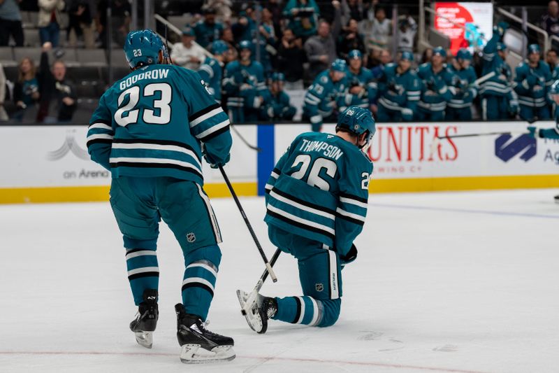 Nov 5, 2024; San Jose, California, USA;  San Jose Sharks defenseman Jack Thompson (26) celebrates after scoring his first NHL goal against the Columbus Blue Jackets during the second period at SAP Center at San Jose. Mandatory Credit: Neville E. Guard-Imagn Images