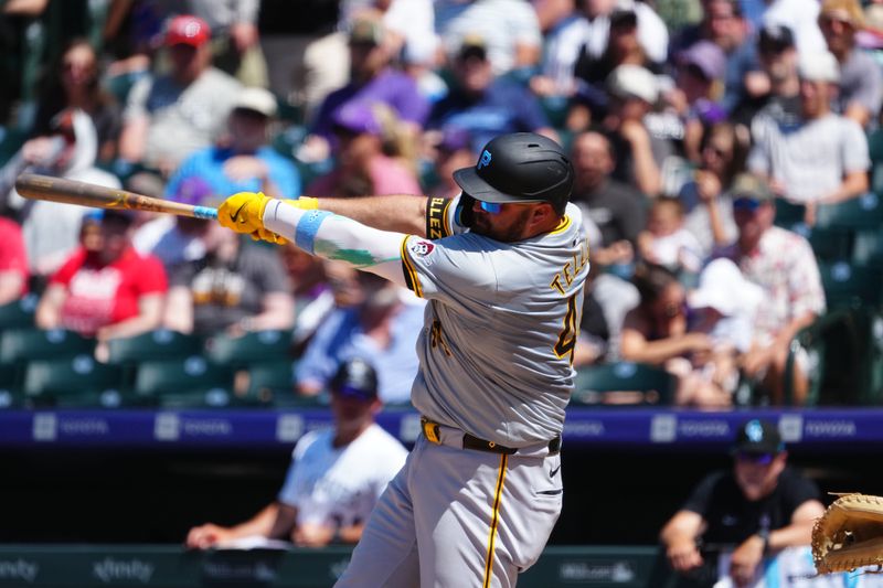 Jun 16, 2024; Denver, Colorado, USA; Pittsburgh Pirates first base Rowdy Tellez (44) hits a two-run single in the seventh inning against the Colorado Rockies at Coors Field. Mandatory Credit: Ron Chenoy-USA TODAY Sports