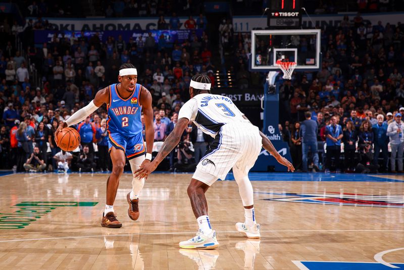 OKLAHOMA CITY, OK - NOVEMBER 4:  Shai Gilgeous-Alexander #2 of the Oklahoma City Thunder dribbles the ball during the game against the Orlando Magic on November 4, 2024 at Paycom Center in Oklahoma City, Oklahoma. NOTE TO USER: User expressly acknowledges and agrees that, by downloading and or using this photograph, User is consenting to the terms and conditions of the Getty Images License Agreement. Mandatory Copyright Notice: Copyright 2024 NBAE (Photo by Zach Beeker/NBAE via Getty Images)