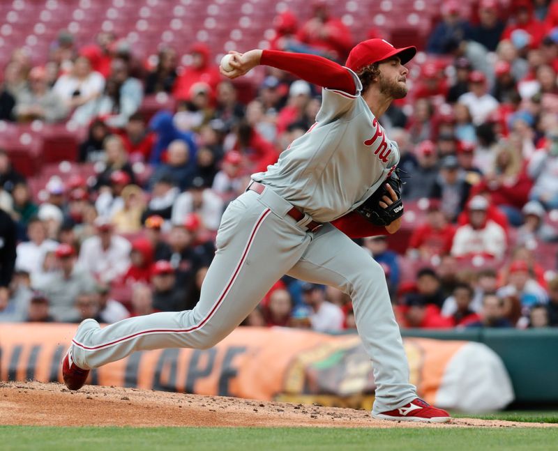 Apr 16, 2023; Cincinnati, Ohio, USA; Philadelphia Phillies starting pitcher Aaron Nola (27) throws against the Cincinnati Reds during the first inning at Great American Ball Park. Mandatory Credit: David Kohl-USA TODAY Sports