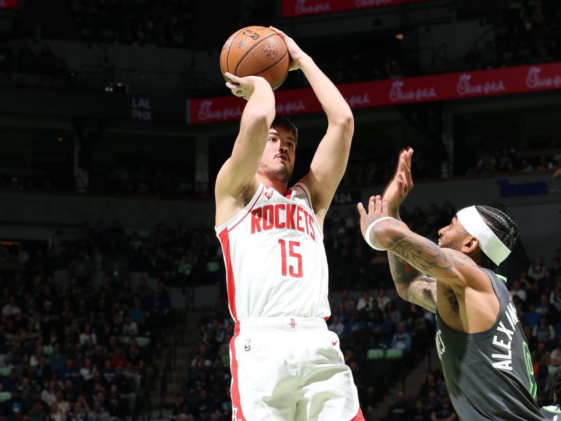 MINNEAPOLIS, MN -  NOVEMBER 26: Reed Sheppard #15 of the Houston Rockets shoots the ball during the game against the Minnesota Timberwolves during the Emirates NBA Cup game on November 26, 2024 at Target Center in Minneapolis, Minnesota. NOTE TO USER: User expressly acknowledges and agrees that, by downloading and or using this Photograph, user is consenting to the terms and conditions of the Getty Images License Agreement. Mandatory Copyright Notice: Copyright 2024 NBAE (Photo by David Sherman/NBAE via Getty Images)