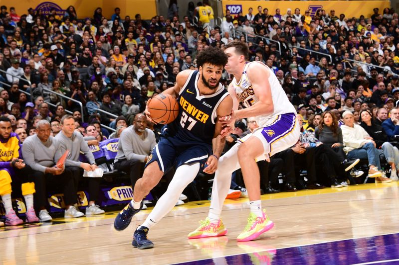 LOS ANGELES, CA - NOVEMBER 23: Jamal Murray #27 of the Denver Nuggets dribbles the ball during the game against the Los Angeles Lakers on November 23, 2024 at Crypto.Com Arena in Los Angeles, California. NOTE TO USER: User expressly acknowledges and agrees that, by downloading and/or using this Photograph, user is consenting to the terms and conditions of the Getty Images License Agreement. Mandatory Copyright Notice: Copyright 2024 NBAE (Photo by Adam Pantozzi/NBAE via Getty Images)