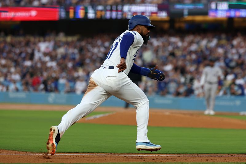 Jun 1, 2024; Los Angeles, California, USA;  Los Angeles Dodgers left fielder Teoscar Hernandez (37) runs to home during the second inning against the Colorado Rockies at Dodger Stadium. Mandatory Credit: Kiyoshi Mio-USA TODAY Sports