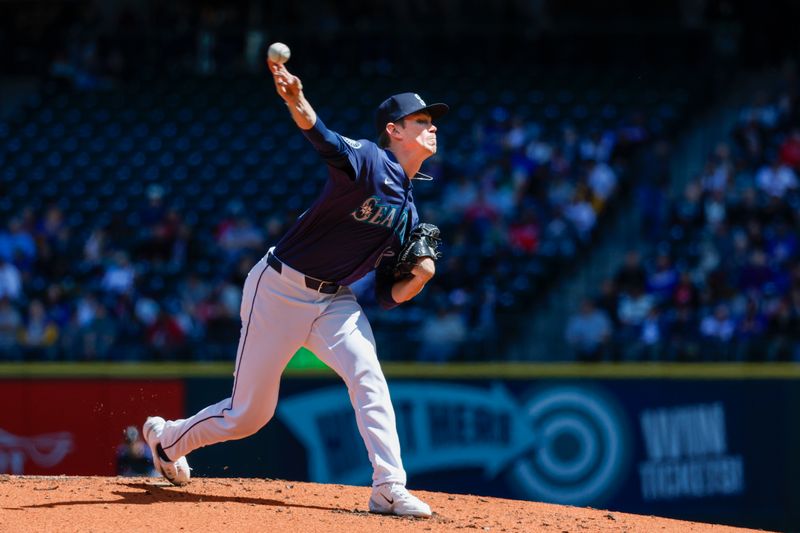 May 1, 2024; Seattle, Washington, USA; Seattle Mariners starting pitcher Emerson Hancock (62) throws against the Atlanta Braves during the second inning at T-Mobile Park. Mandatory Credit: Joe Nicholson-USA TODAY Sports
