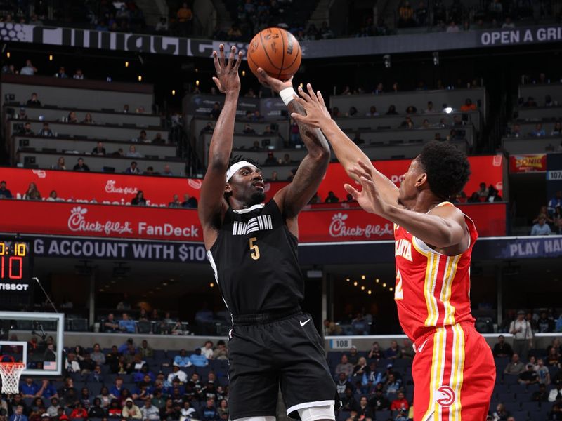 MEMPHIS, TN - MARCH 8: Vince Williams Jr. #5 of the Memphis Grizzlies shoots the ball during the game against the Atlanta Hawks on March 8, 2024 at FedExForum in Memphis, Tennessee. NOTE TO USER: User expressly acknowledges and agrees that, by downloading and or using this photograph, User is consenting to the terms and conditions of the Getty Images License Agreement. Mandatory Copyright Notice: Copyright 2024 NBAE (Photo by Joe Murphy/NBAE via Getty Images)