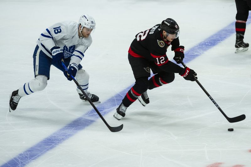 Jan 25, 2025; Ottawa, Ontario, CAN; Toronto Maple Leafs center Steven Lorentz (18) chases Ottawa Senators center Shane Pinto (12) in the third period at the Canadian Tire Centre. Mandatory Credit: Marc DesRosiers-Imagn Images