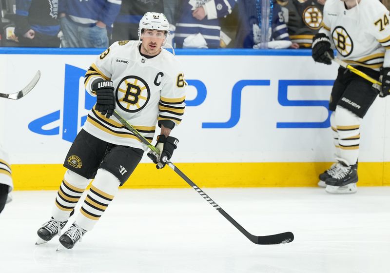 Apr 27, 2024; Toronto, Ontario, CAN; Boston Bruins left wing Brad Marchand (63) skates during the warmup before game four of the first round of the 2024 Stanley Cup Playoffs against the Toronto Maple Leafs at Scotiabank Arena. Mandatory Credit: Nick Turchiaro-USA TODAY SportsMandatory Credit: Nick Turchiaro-USA TODAY Sports