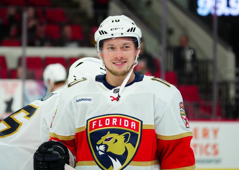 Mar 14, 2024; Raleigh, North Carolina, USA; Florida Panthers right wing Vladimir Tarasenko (10)  smiles during  the warmups before the game against the Carolina Hurricanes at PNC Arena. Mandatory Credit: James Guillory-USA TODAY Sports