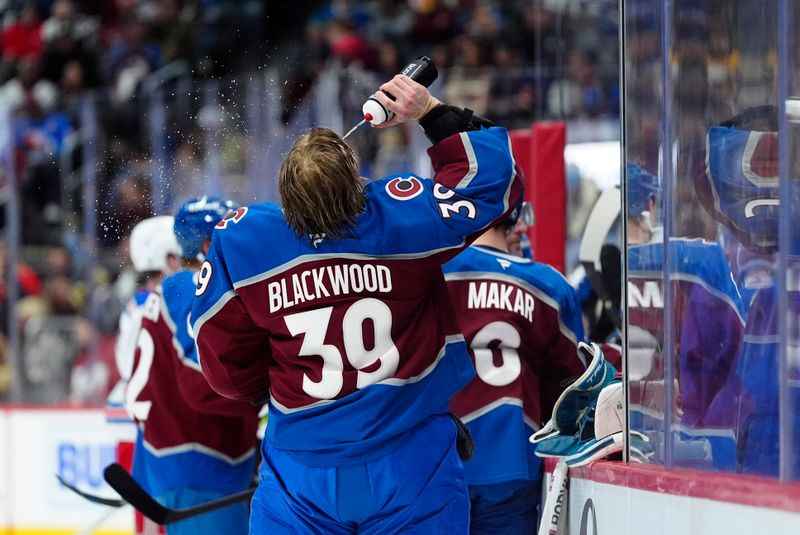 Jan 14, 2025; Denver, Colorado, USA; Colorado Avalanche goaltender Mackenzie Blackwood (39) during the first period against the New York Rangers at Ball Arena. Mandatory Credit: Ron Chenoy-Imagn Images