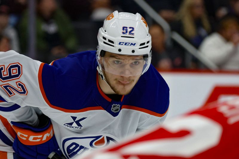 Oct 27, 2024; Detroit, Michigan, USA; Edmonton Oilers right wing Vasily Podkolzin (92) looks on during a face off in the first period of the game against the Detroit Red Wings at Little Caesars Arena. Mandatory Credit: Brian Bradshaw Sevald-Imagn Images